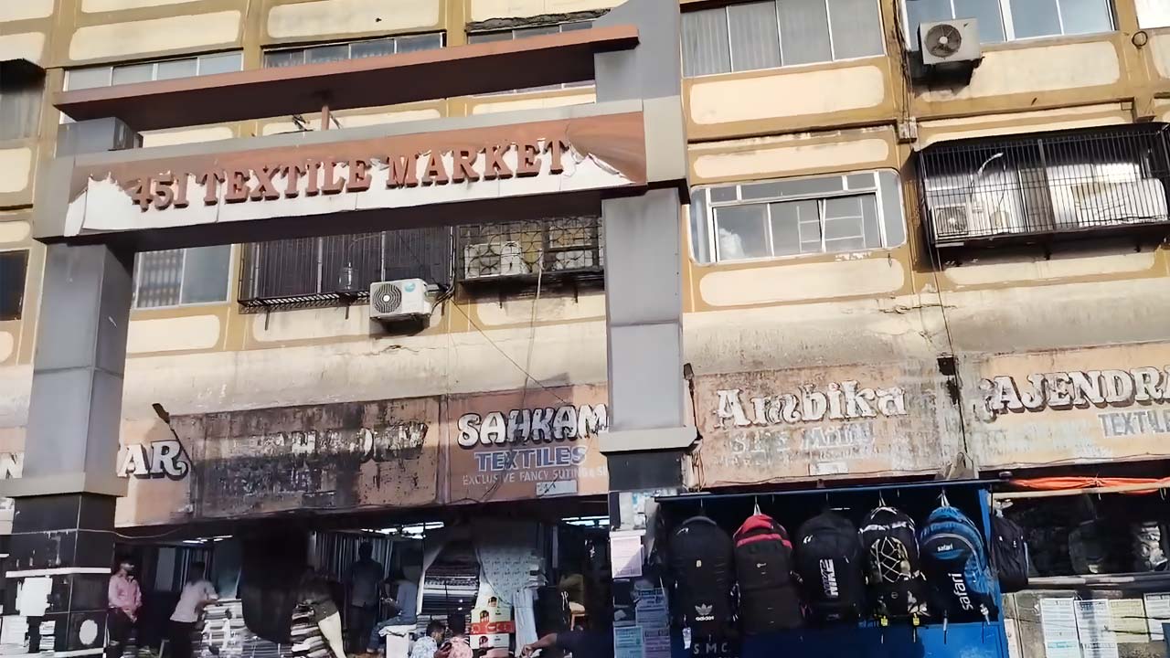451 Textile Market Surat main entrance with wholesale shops and storefronts