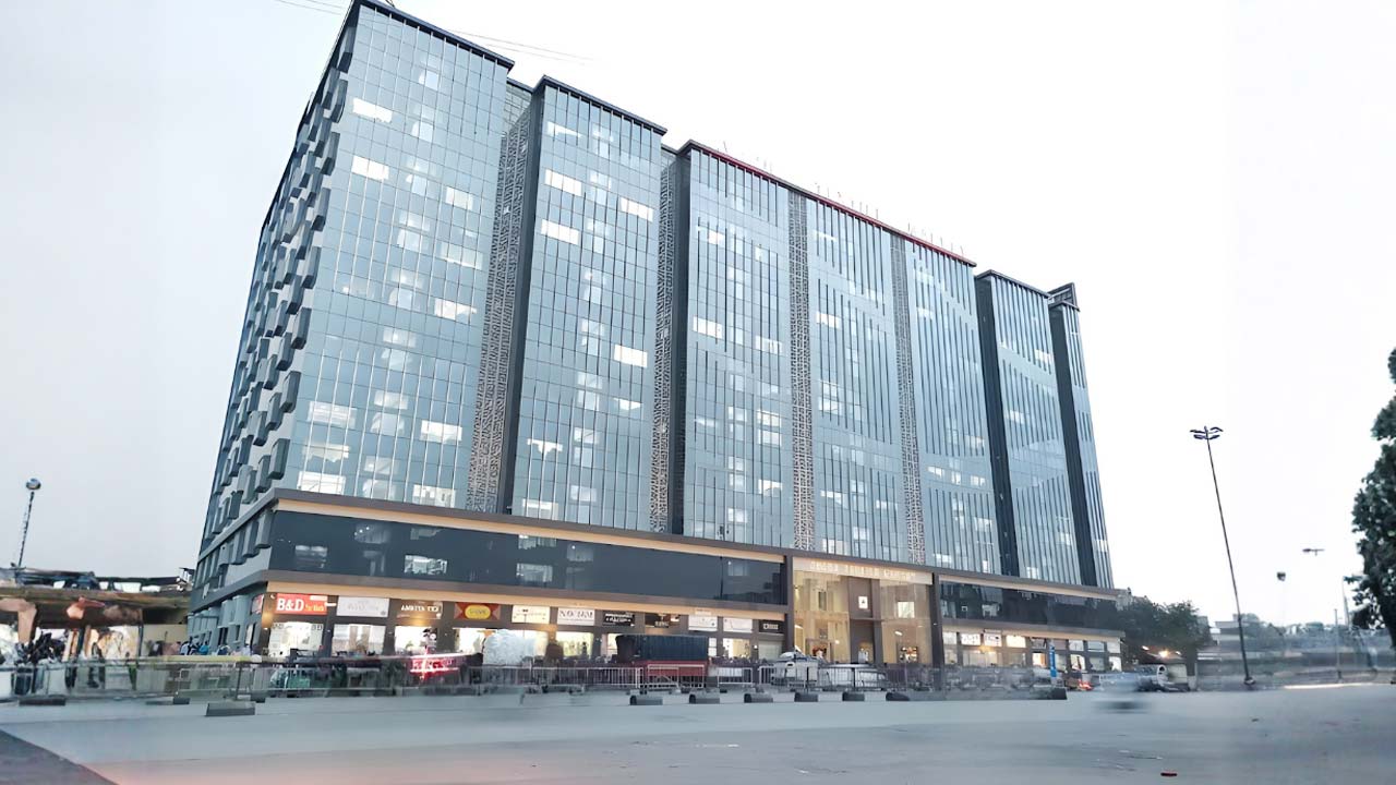 Avadh Textile Market Surat modern glass building with wholesale garment showrooms