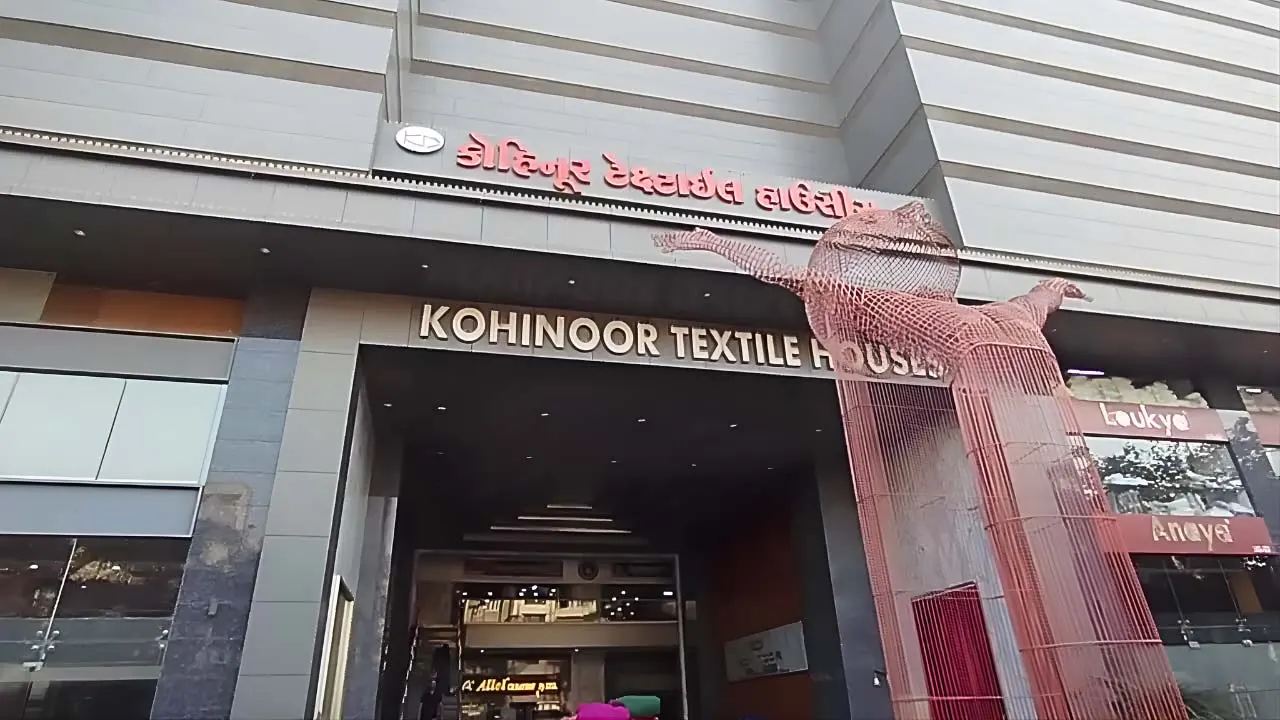 Kohinoor Textile House entrance building in New Textile Market Surat