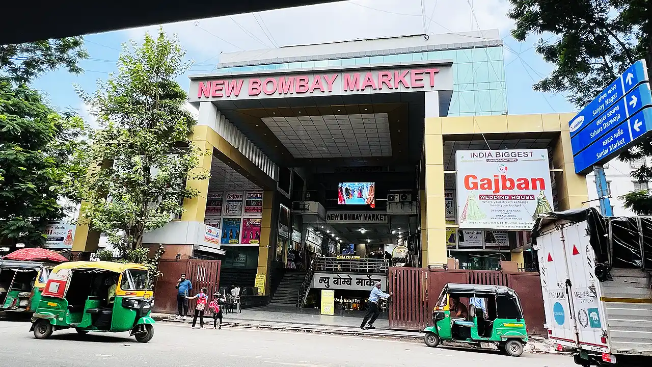 Main entrance gate and multi story facade of New Bombay Market near Sahara Darwaja in Surat
