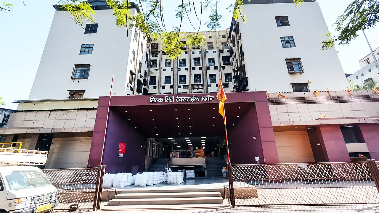 Main entrance of Silk City Textile Market in Surat, a wholesale textile market known for sarees, dress materials, fabrics, and garment suppliers.