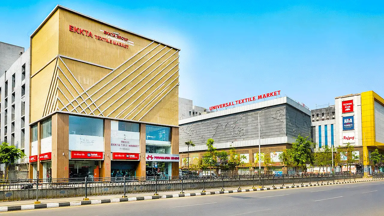 Front view of Ekkta Textile Market on Ring Road, Surat, a wholesale textile market known for sarees, kurtis, dress materials, and ladies ethnic wear.