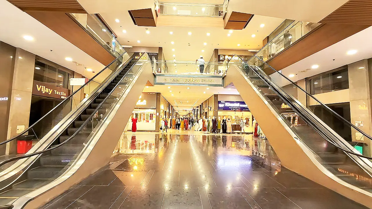 Globale Textile Market Surat interior with escalators and textile shops